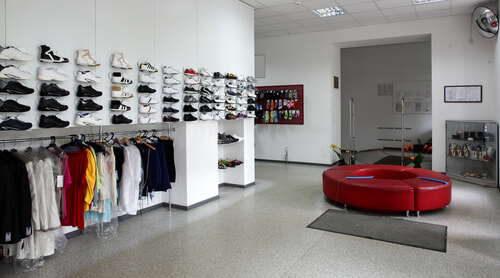 commercial retail space with concrete flooring and white walls