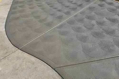 new concrete walkway with swirl finish